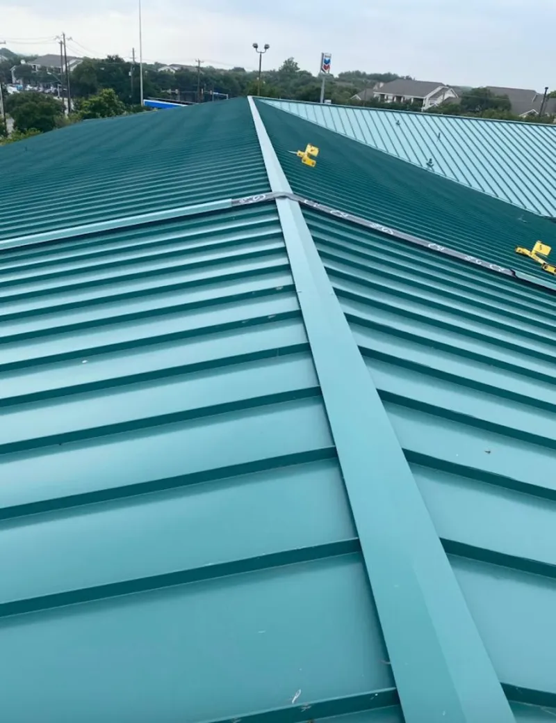 Green commercial metal roof ridge and valley for Metal Roof Repair in Westminster